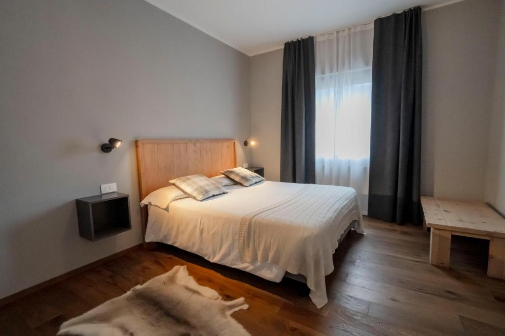 Postel nebo postele na pokoji v ubytování Condhotel Fanti
