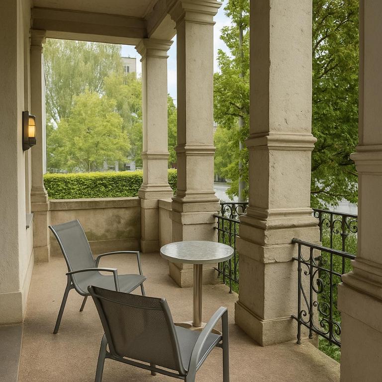Balkón nebo terasa v ubytování Hotel Villa Kipping am Hauptbahnhof