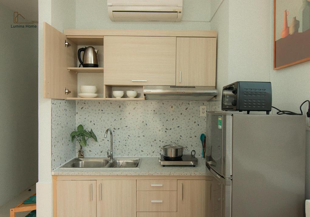 Kuchyň nebo kuchyňský kout v ubytování Lumina Home