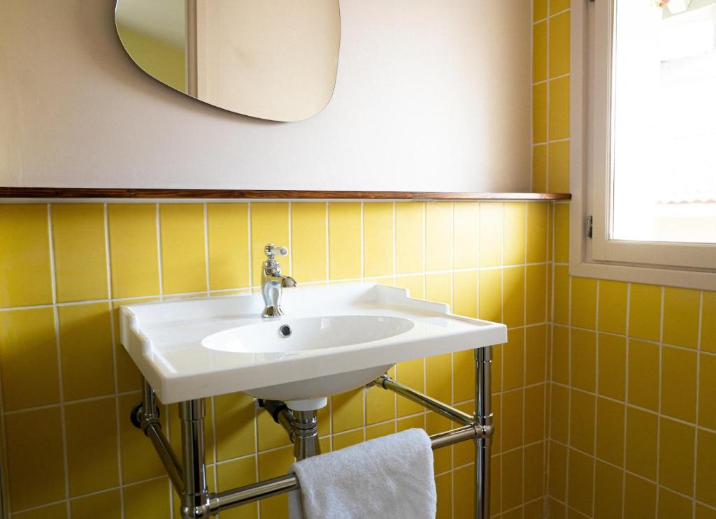 Koupelna v ubytování Hotel Bleu Soleil
