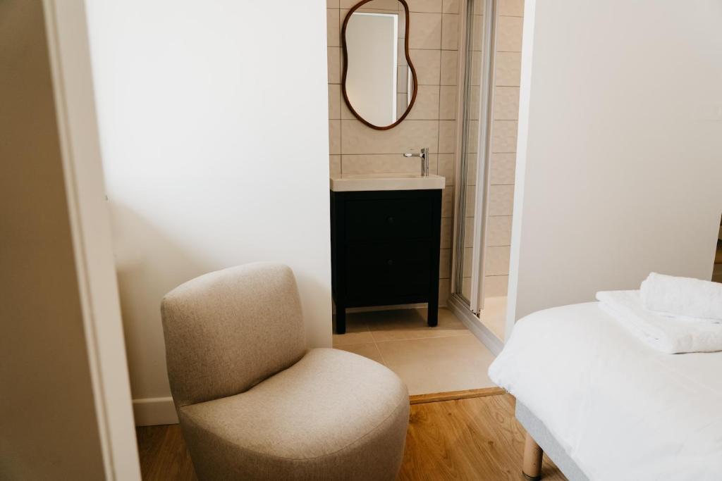 Postel nebo postele na pokoji v ubytování Hotel Bleu Soleil