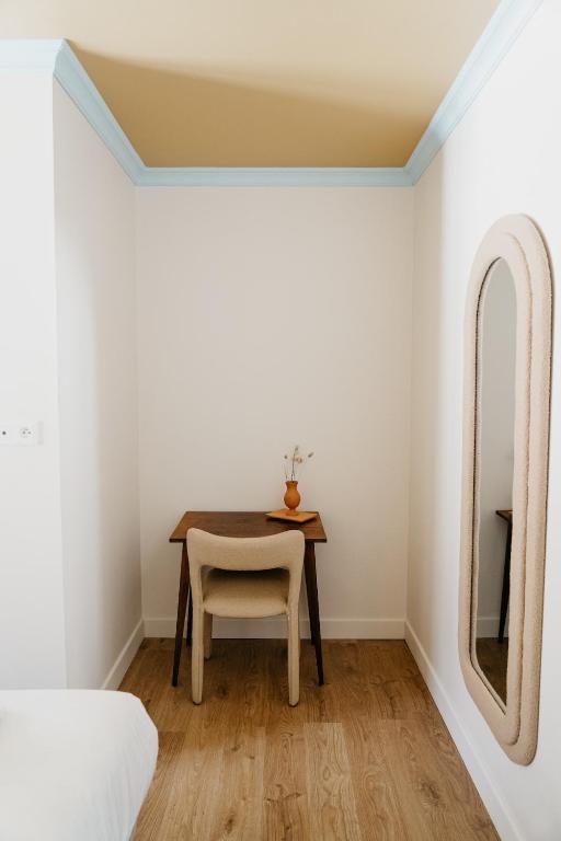 Postel nebo postele na pokoji v ubytování Hotel Bleu Soleil