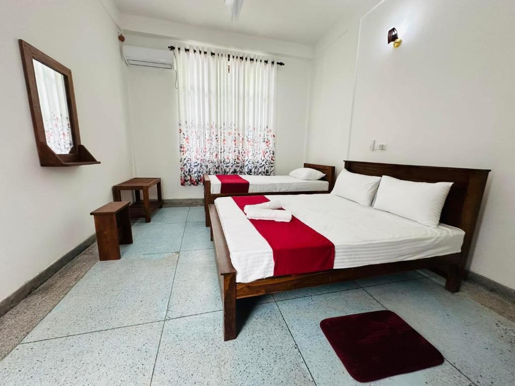 Postel nebo postele na pokoji v ubytování Malin Villa
