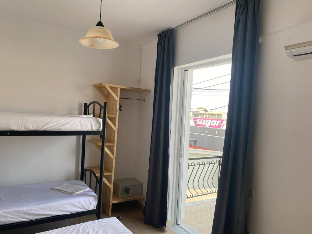Postel nebo postele na pokoji v ubytování Mary Studios