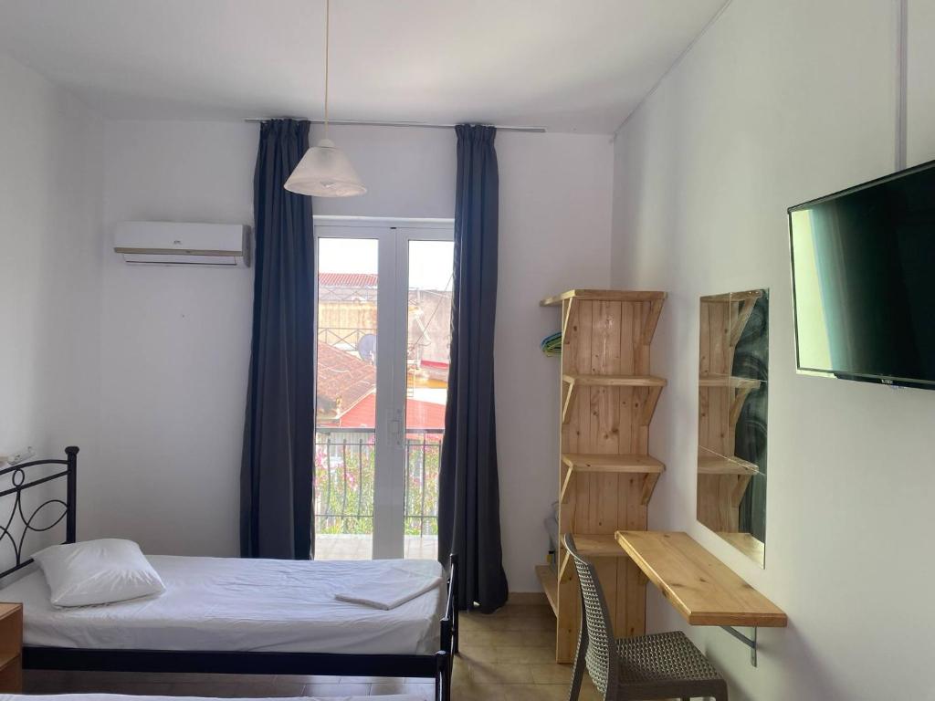 Postel nebo postele na pokoji v ubytování Mary Studios