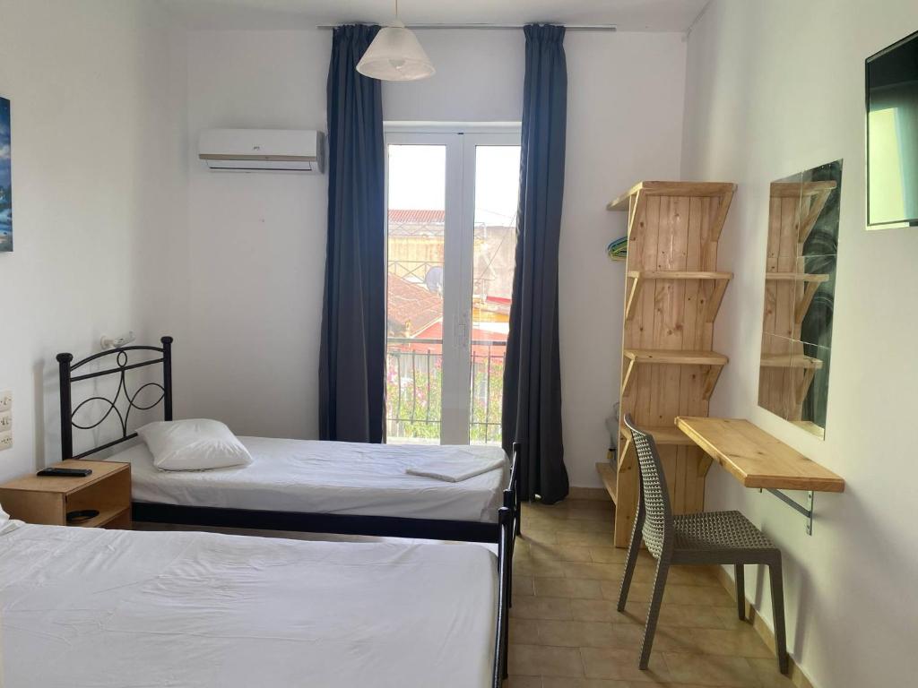 Postel nebo postele na pokoji v ubytování Mary Studios