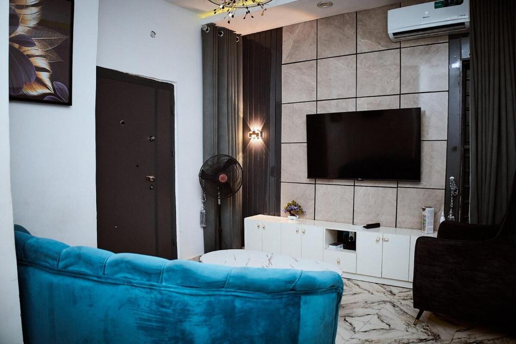 TV a/nebo společenská místnost v ubytování 1bed apartment with balcony and Pool