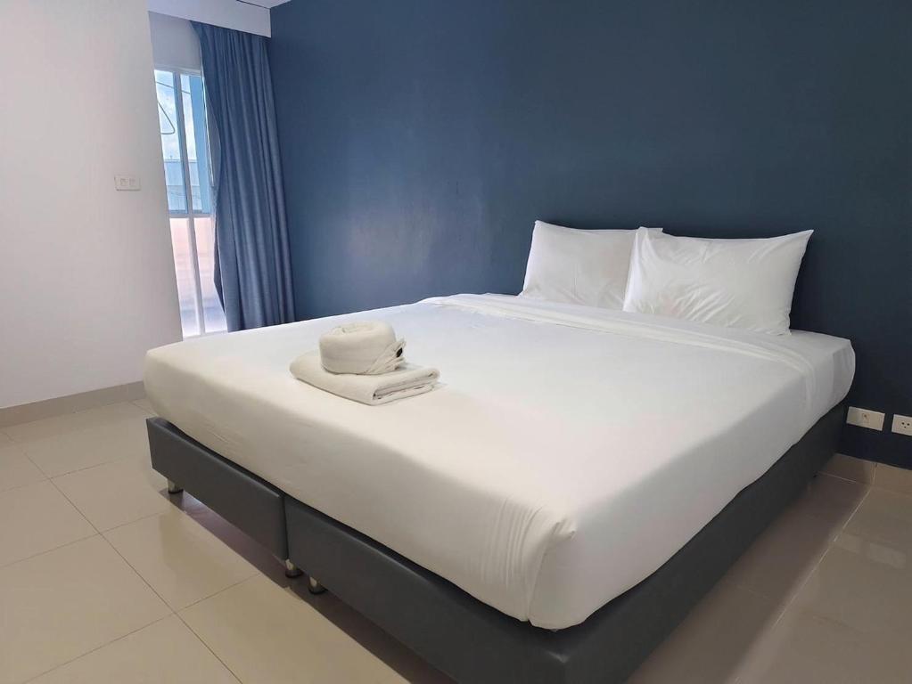 Postel nebo postele na pokoji v ubytování Terminal2 Hotel Phuket