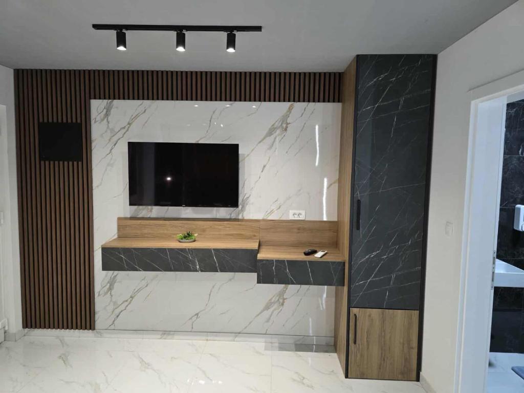 Kuchyň nebo kuchyňský kout v ubytování Hotel Villa Nadin