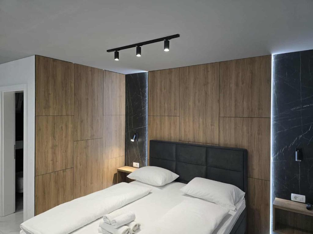 Postel nebo postele na pokoji v ubytování Hotel Villa Nadin