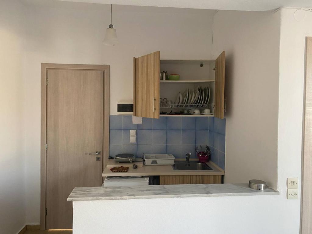 Kuchyň nebo kuchyňský kout v ubytování Mary Studios