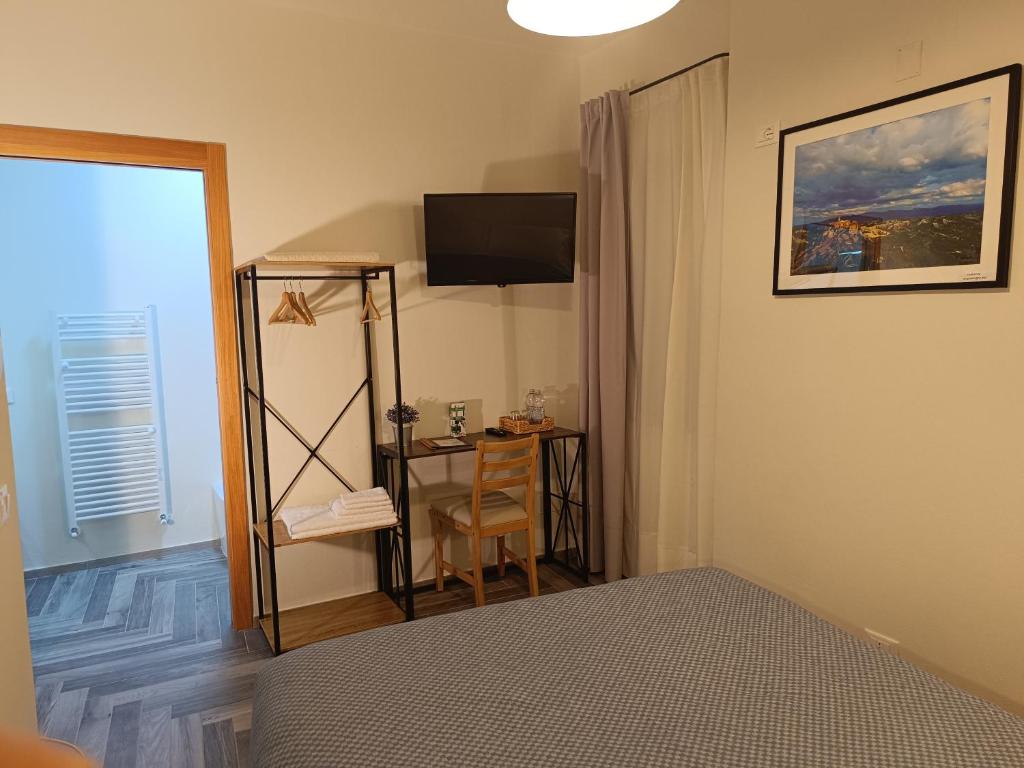 Letto o letti in una camera di Il Rifugio del Borgo