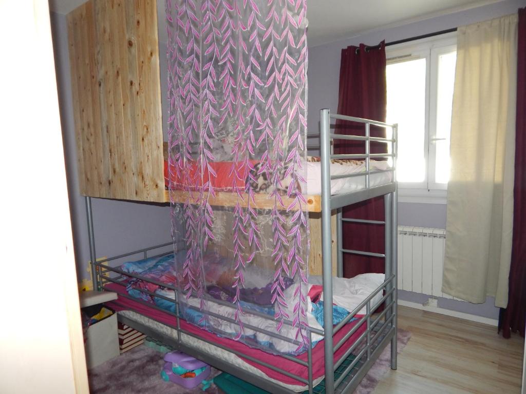 Postel nebo postele na pokoji v ubytování L'Instant d'Aurel