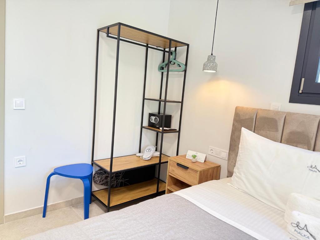 Postel nebo postele na pokoji v ubytování Malka Premium Suites