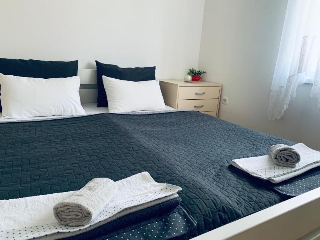 Ένα ή περισσότερα κρεβάτια σε δωμάτιο στο Apartment Abras