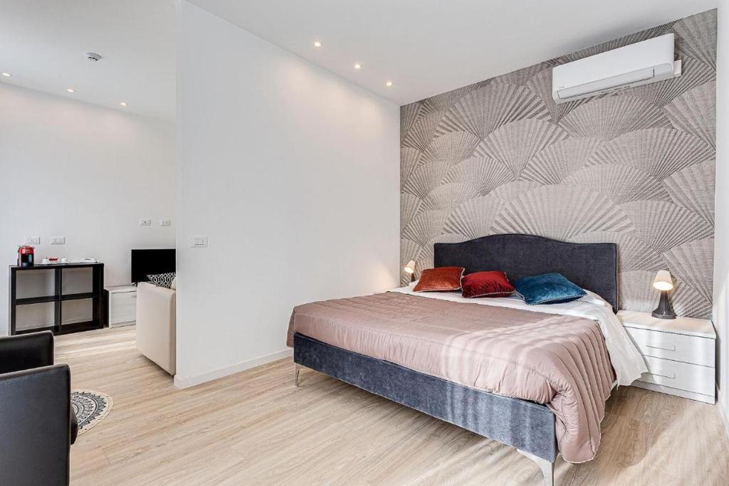 Postel nebo postele na pokoji v ubytování Hotel Anversa