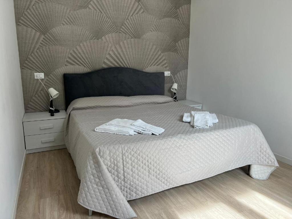 Postel nebo postele na pokoji v ubytování Hotel Anversa