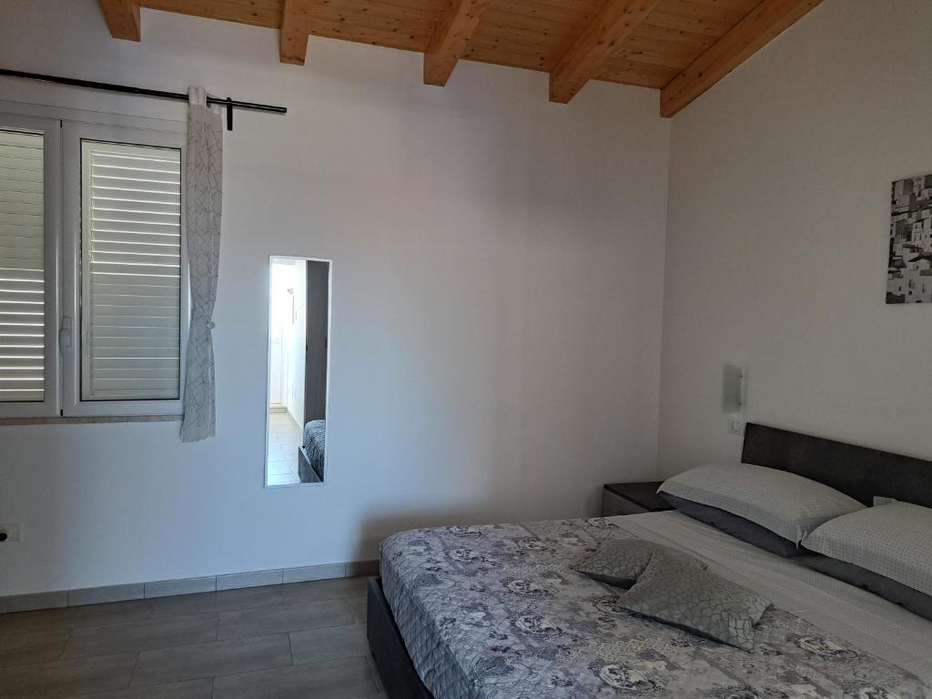 Postel nebo postele na pokoji v ubytování Da Orazio