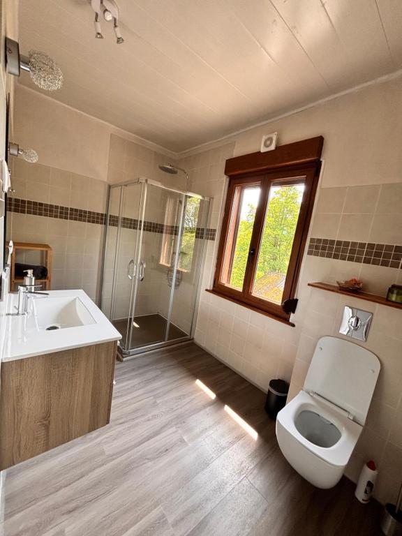 Koupelna v ubytování Chambre double dans Auberge Alsacienne