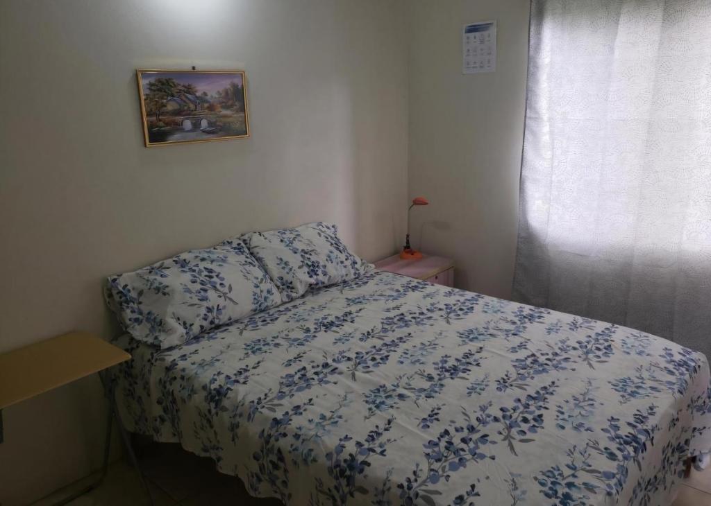 Postel nebo postele na pokoji v ubytování East Caribbean Lodging