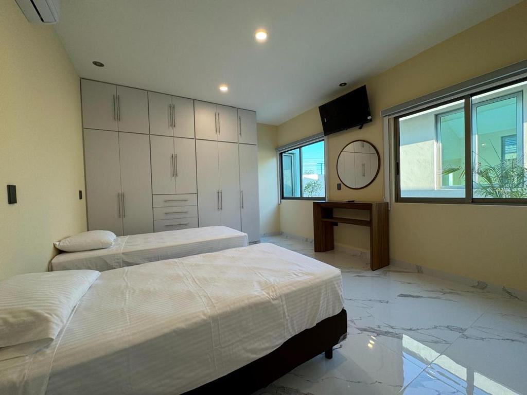 Un pat sau paturi într-o cameră la Estancia de Lujo La Cantera