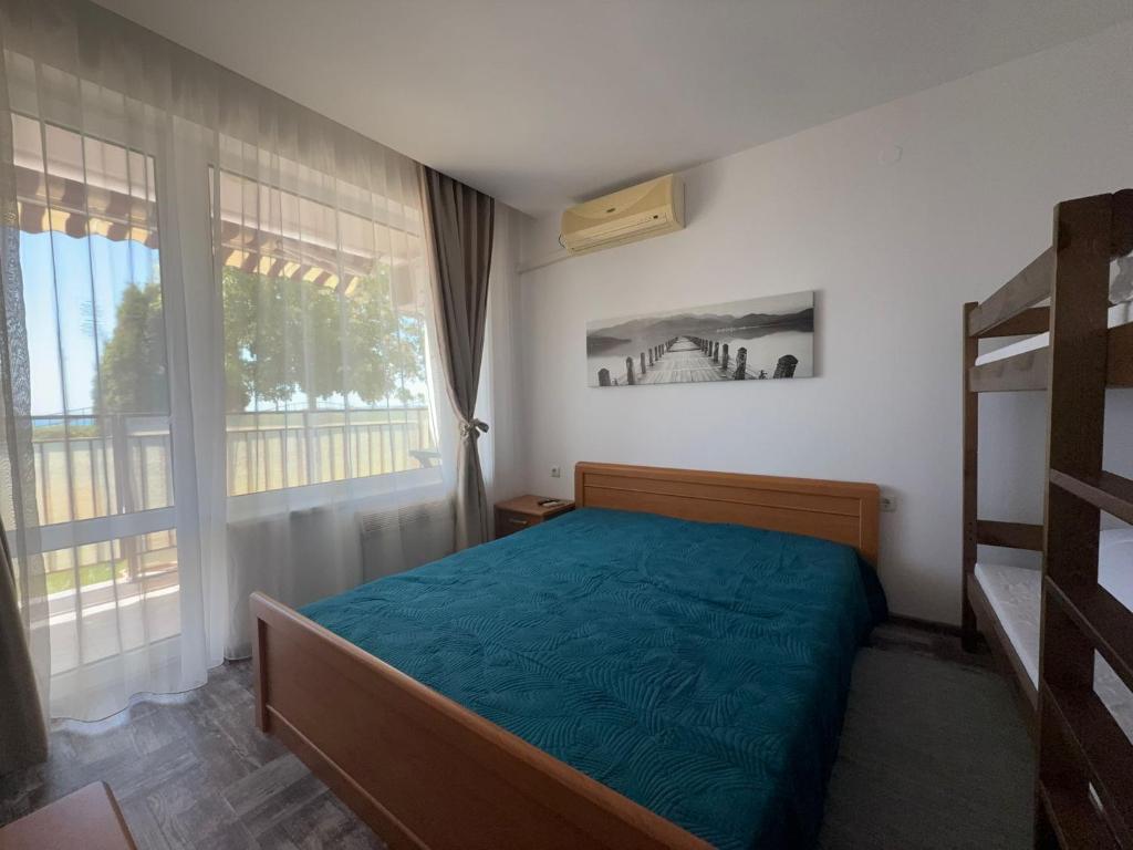 Postel nebo postele na pokoji v ubytování Beach Gate