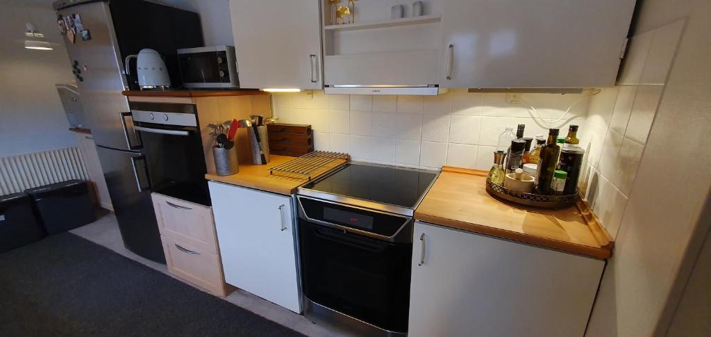 Kuchyň nebo kuchyňský kout v ubytování Cozy House