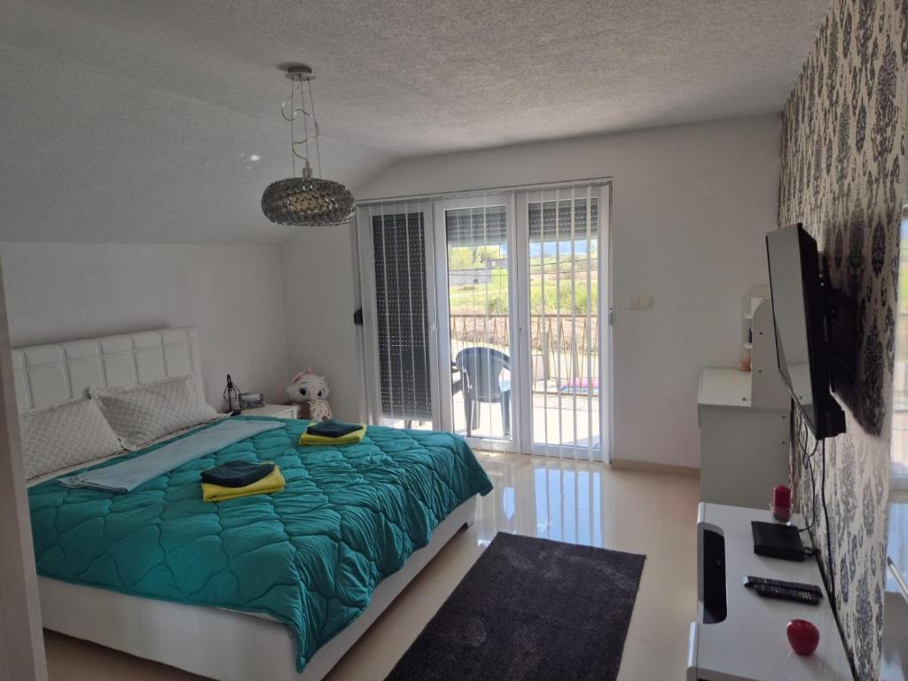 Postel nebo postele na pokoji v ubytování Apartman IN