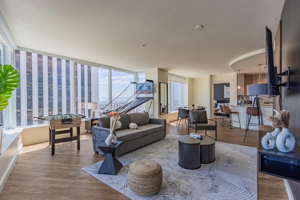 a living room with a couch and a table at Elegant 22nd Flr HighRise DT, Gym, Pool, Parking, W-D in Phoenix