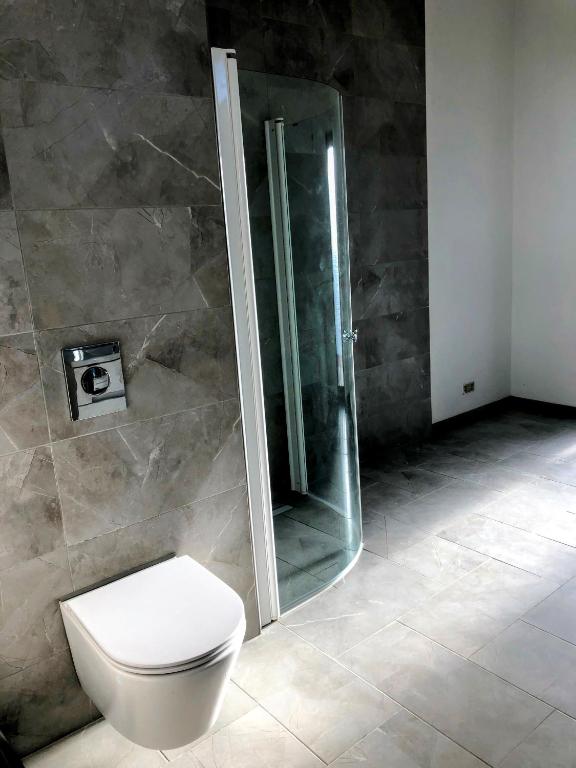 Koupelna v ubytování Domus Revado