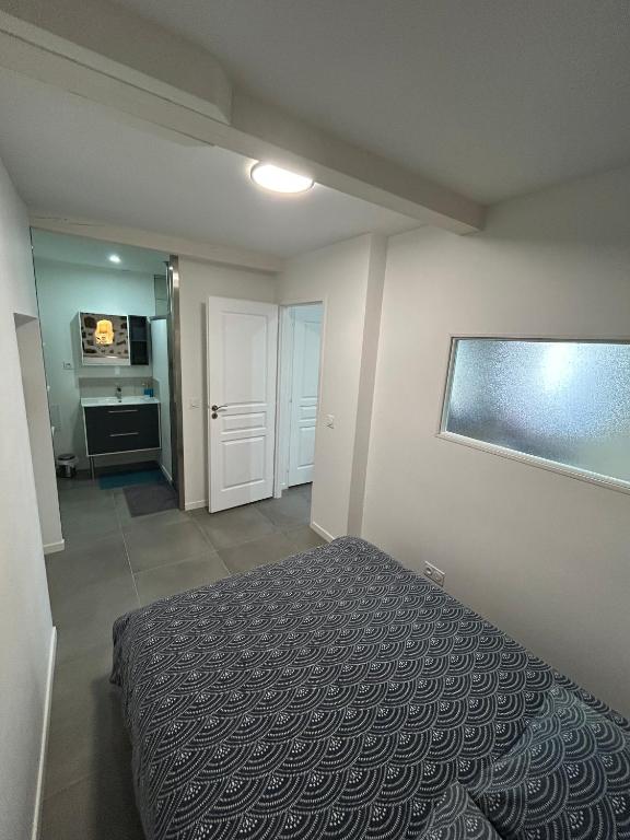 Kuchyňa alebo kuchynka v ubytovaní Appartement entre Saint-Malo, Dinard, Dinan et Dol
