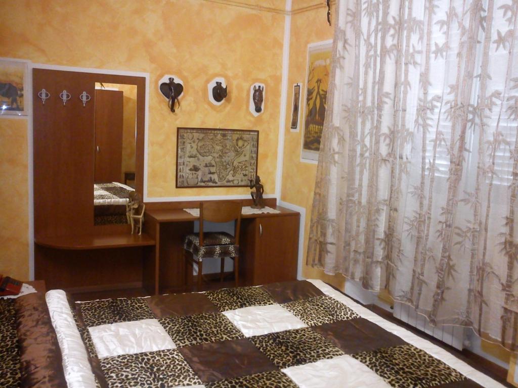 Postel nebo postele na pokoji v ubytování Albergo Astro