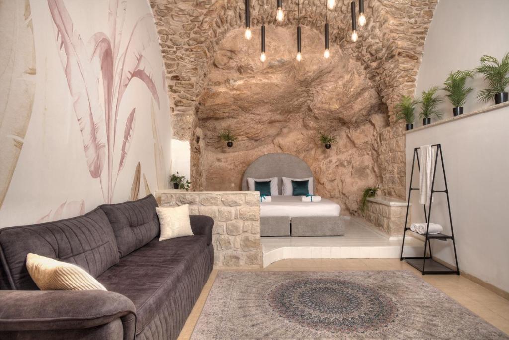 Posezení v ubytování בראשית - סוויטות בוטיק בצפת העתיקה - Beresheet - Boutique Suites in the Old City