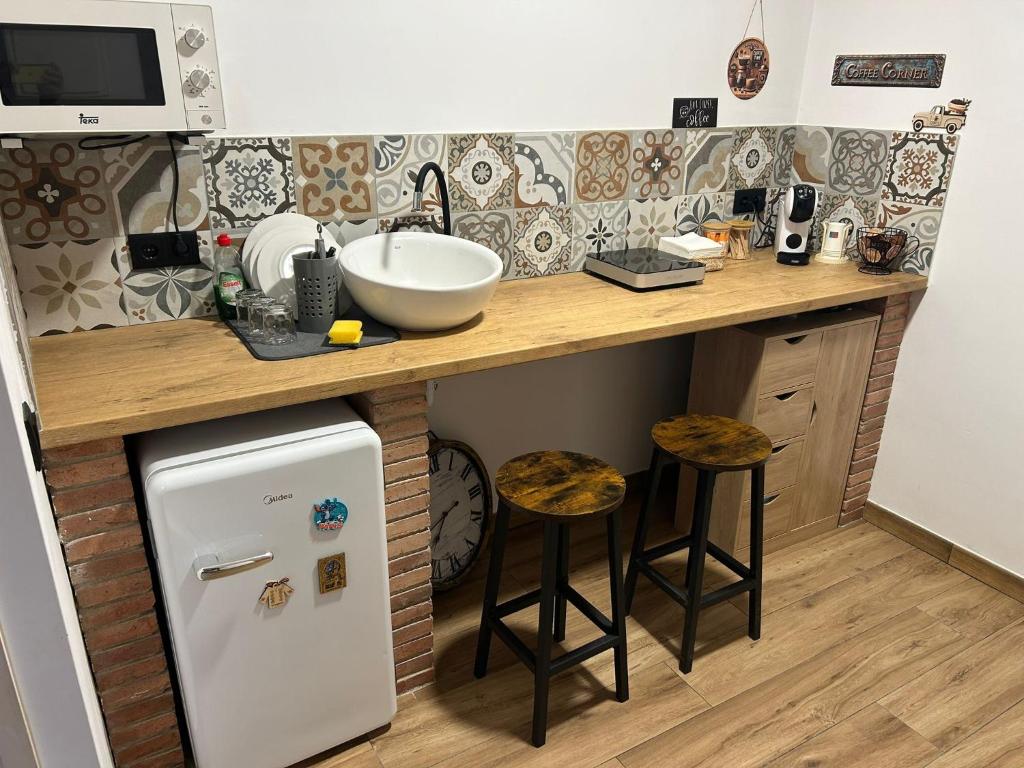Kuchyň nebo kuchyňský kout v ubytování Habitació amb encant a Blanes