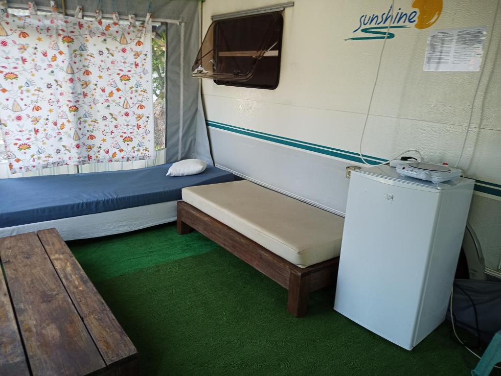 Postel nebo postele na pokoji v ubytování Къмпинг - Бунгала "НЕСТИНАРКА", Царево Camping - Bunglalows "NESTINARKA", Tzarevo
