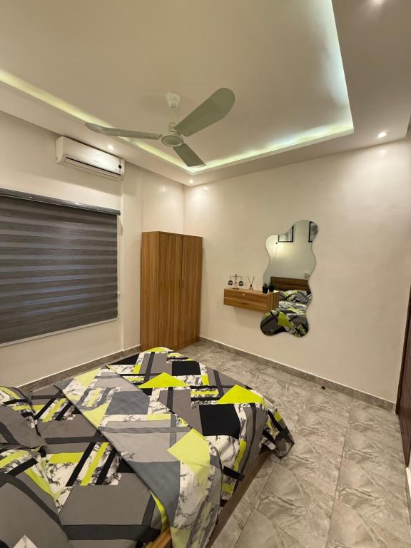 Llit o llits en una habitació de Bralux