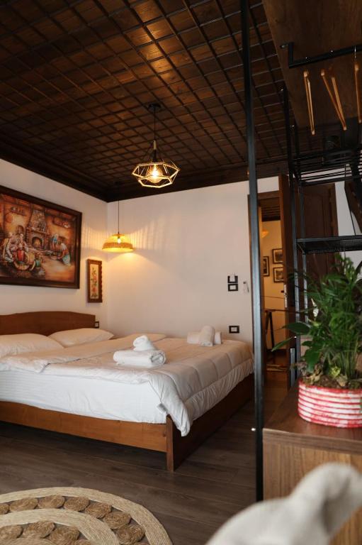 Postel nebo postele na pokoji v ubytování Ador Boutique Hotel