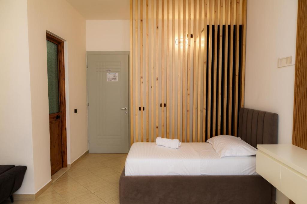 Postel nebo postele na pokoji v ubytování Eden Hotel