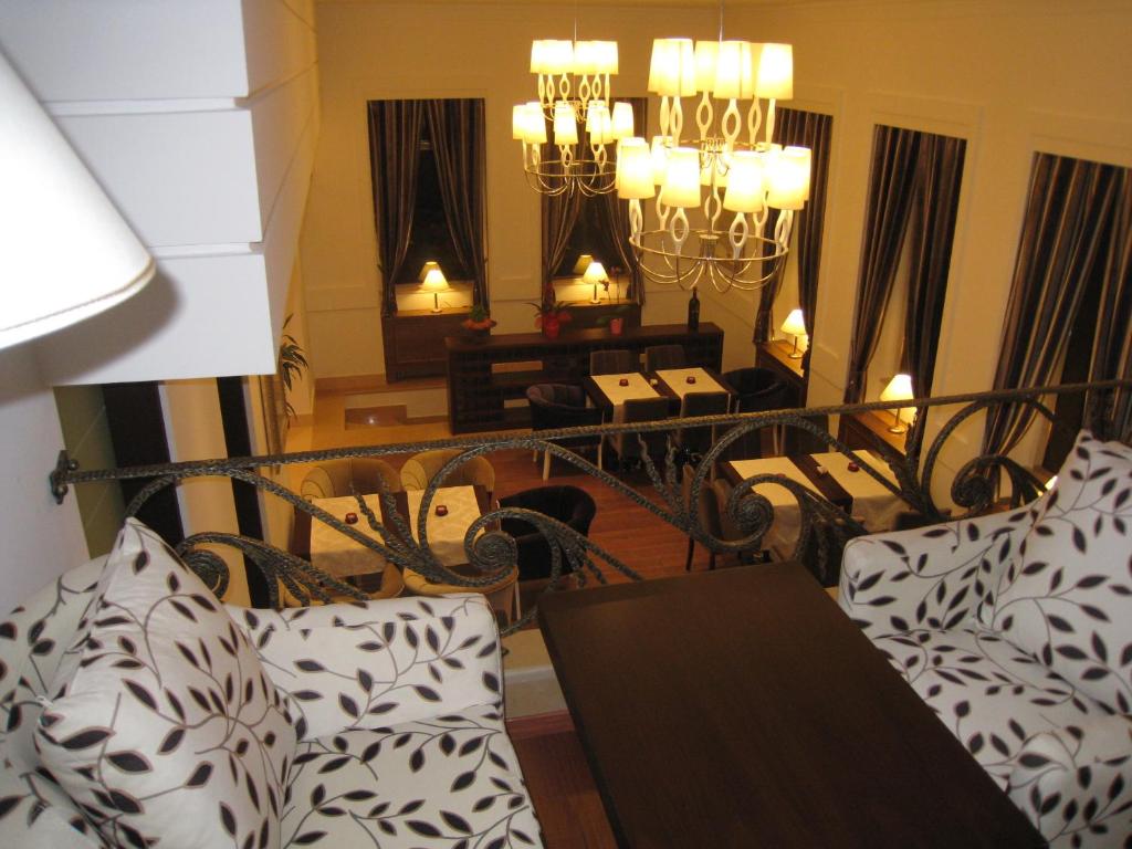 Postel nebo postele na pokoji v ubytování Boutique Hotel Kotoni