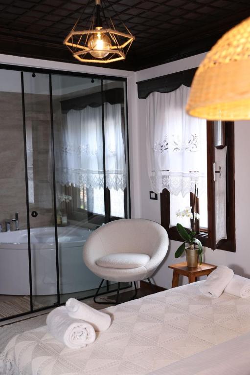 Postel nebo postele na pokoji v ubytování Ador Boutique Hotel
