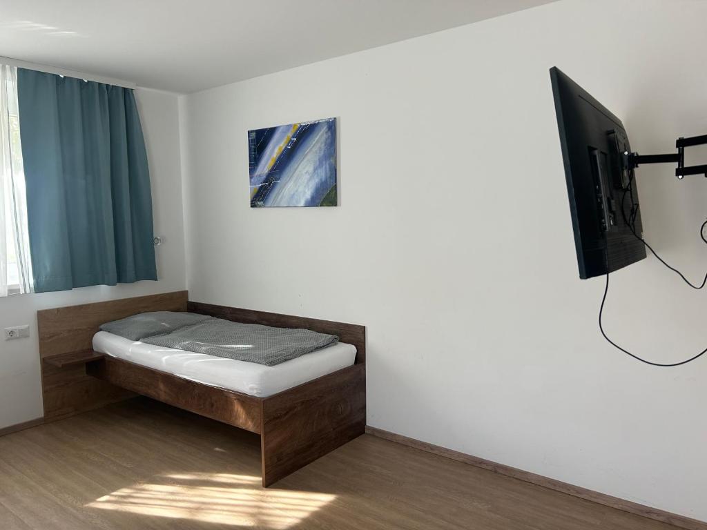 TV a/nebo společenská místnost v ubytování FarawayHomes Aparthotel Krems