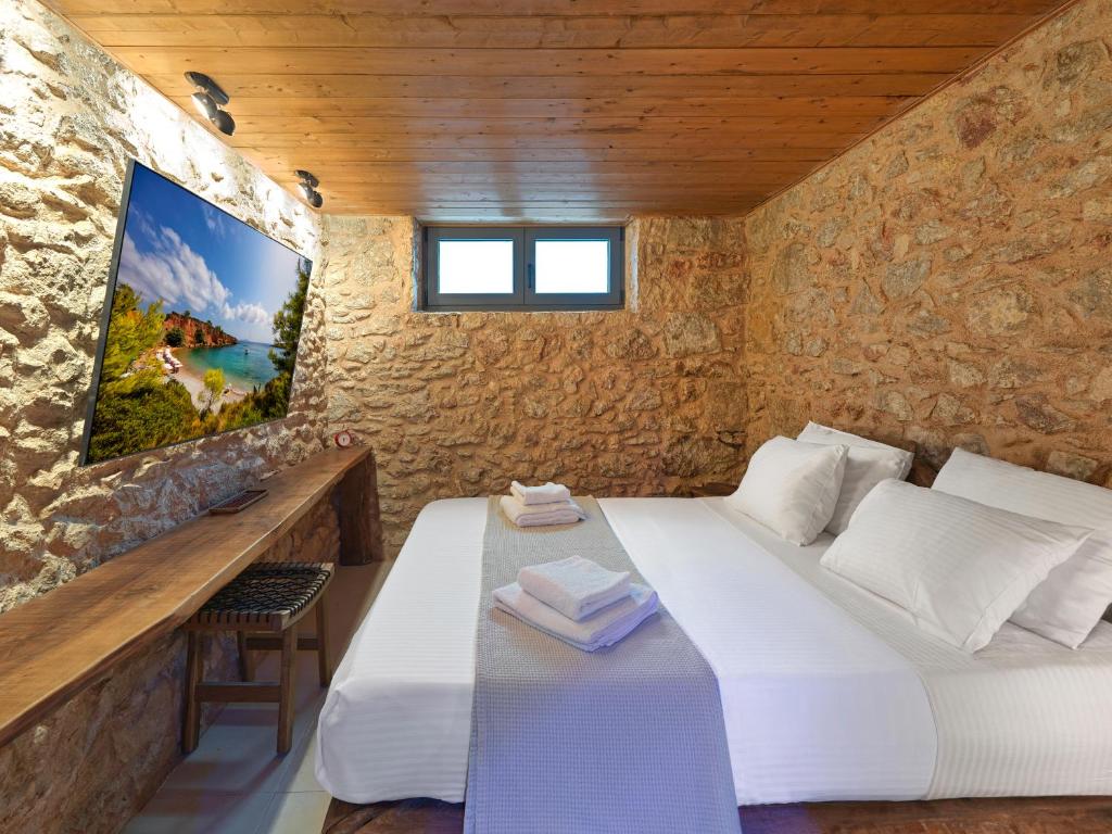 Postel nebo postele na pokoji v ubytování Sea View Garden Suites