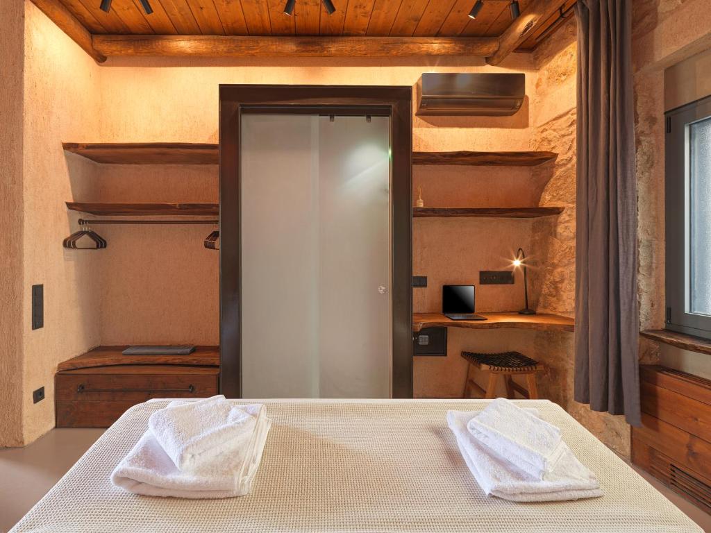 Postel nebo postele na pokoji v ubytování Sea View Garden Suites