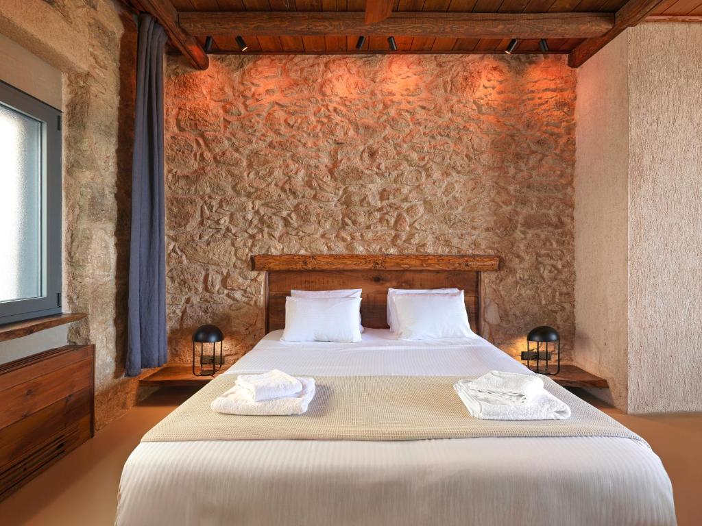 Postel nebo postele na pokoji v ubytování Sea View Garden Suites
