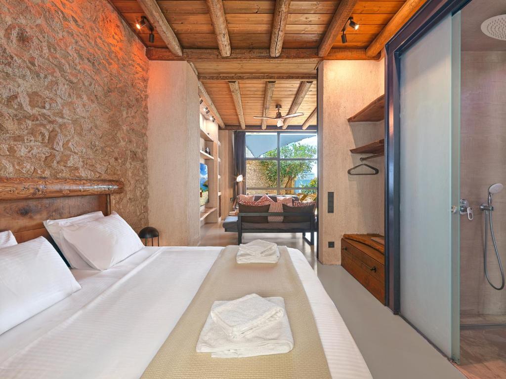 Postel nebo postele na pokoji v ubytování Sea View Garden Suites