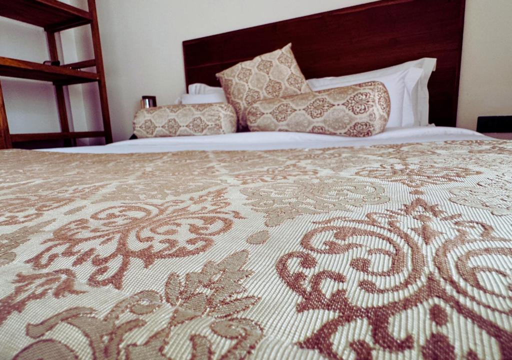 Postel nebo postele na pokoji v ubytování Diyakawa Boutique Hotel