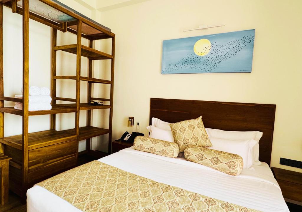 Postel nebo postele na pokoji v ubytování Diyakawa Boutique Hotel