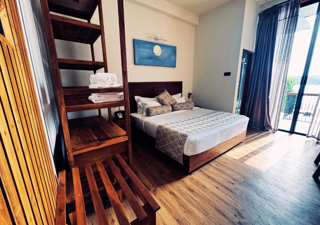 Postel nebo postele na pokoji v ubytování Diyakawa Boutique Hotel