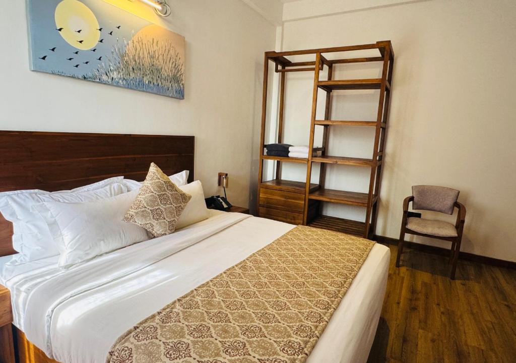 Postel nebo postele na pokoji v ubytování Diyakawa Boutique Hotel