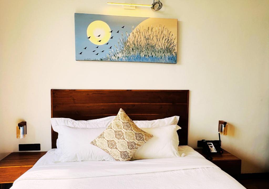 Postel nebo postele na pokoji v ubytování Diyakawa Boutique Hotel